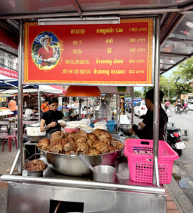 chiang mai food tour cowboy hat lady