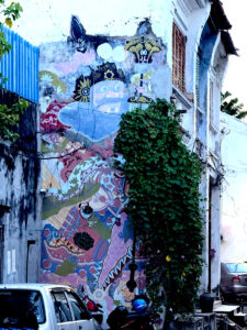 living like im dying purple man mural penang malaysia