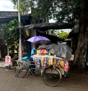 living like im dying street vendor geroge town
