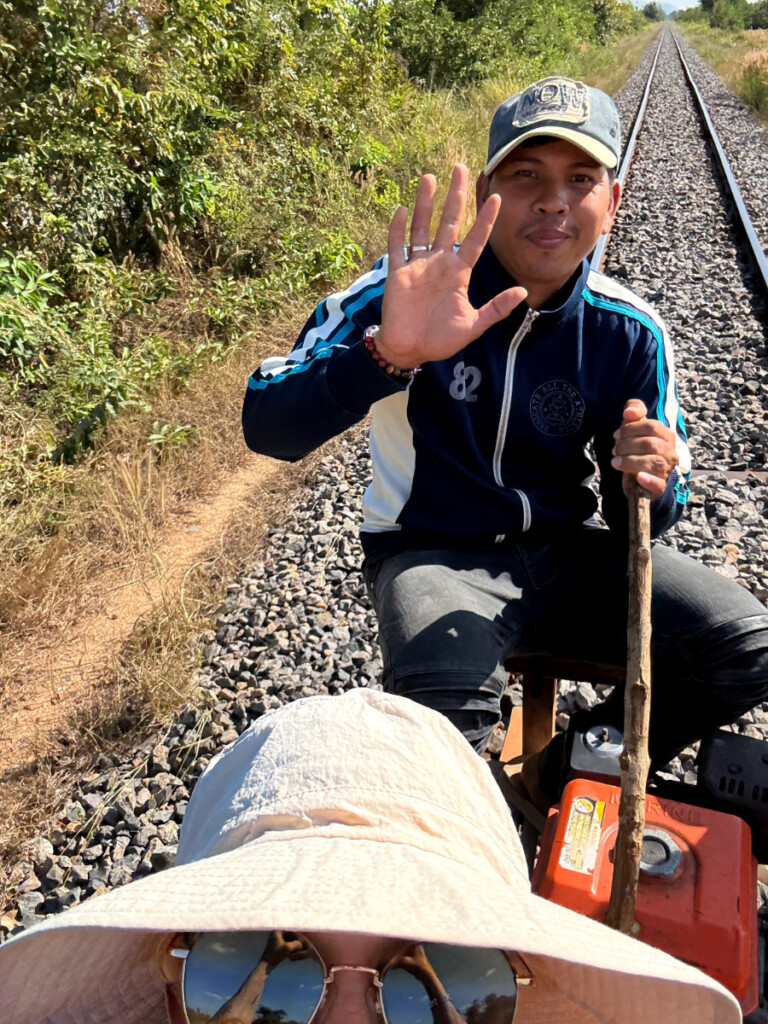 Battambang, Bamboo Train, BBQ Rats, and the Killing Cave 13 living like im dying bamboo train driver balambang cambodia