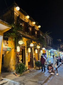 living like im dying hoi an yellow building vietnam