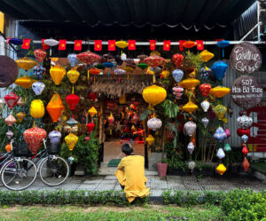 living like im dying latern painting hoi an