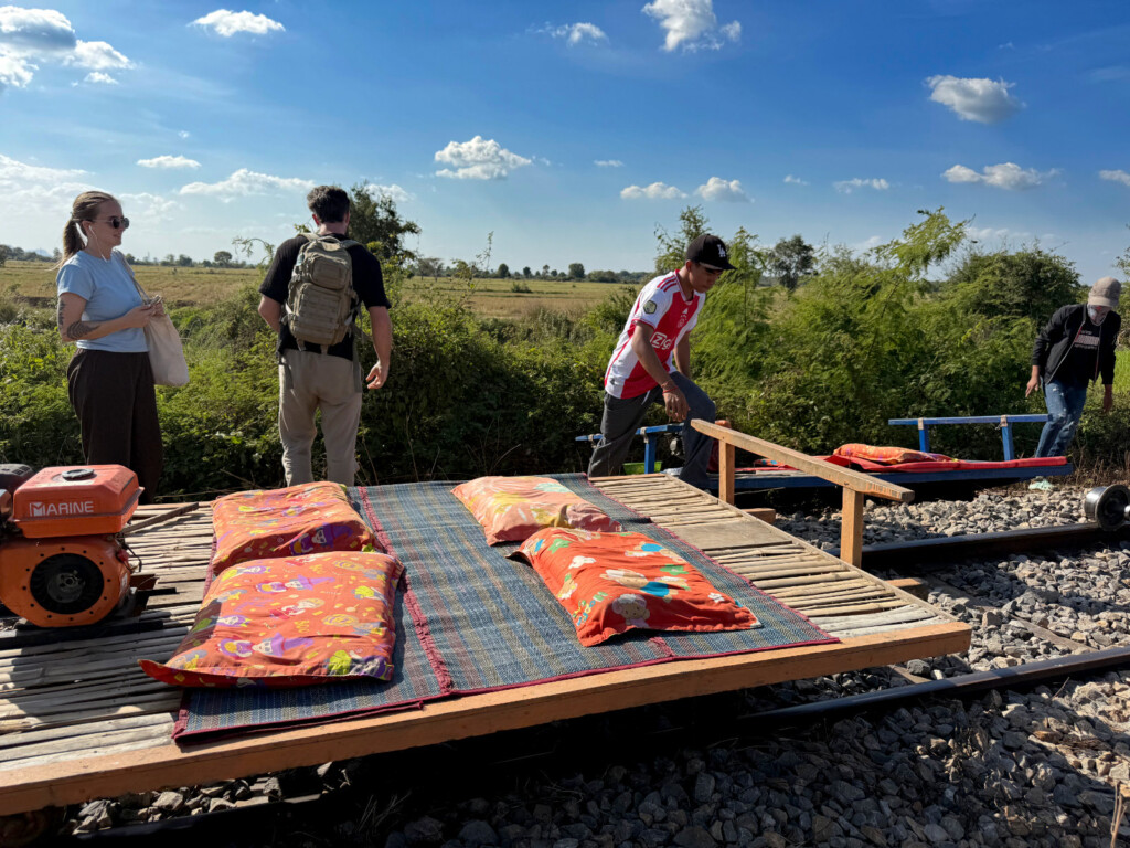 Battambang, Bamboo Train, BBQ Rats, and the Killing Cave 4 living like im dying train seat battambang cambodia