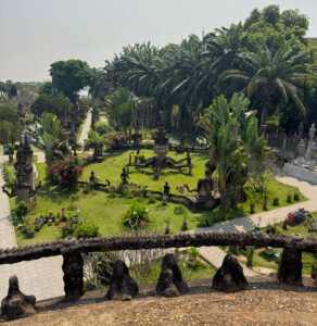 living like im dying atop buddha park vientiane laos