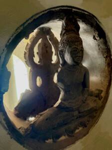 Hot in Vientiane and One Massage Too Far 18 vientiane patuxai buddha window laos