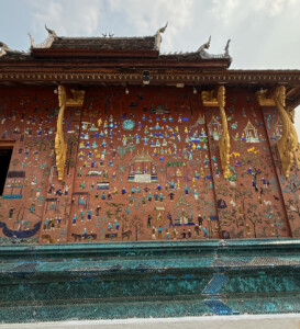 What the Hell Happened in Luang Prabang? 11 luang prabang temple mosaic wall laos